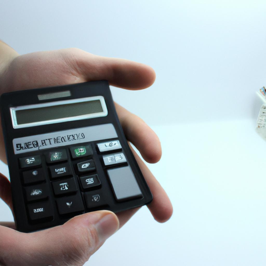 Person holding mortgage and calculator