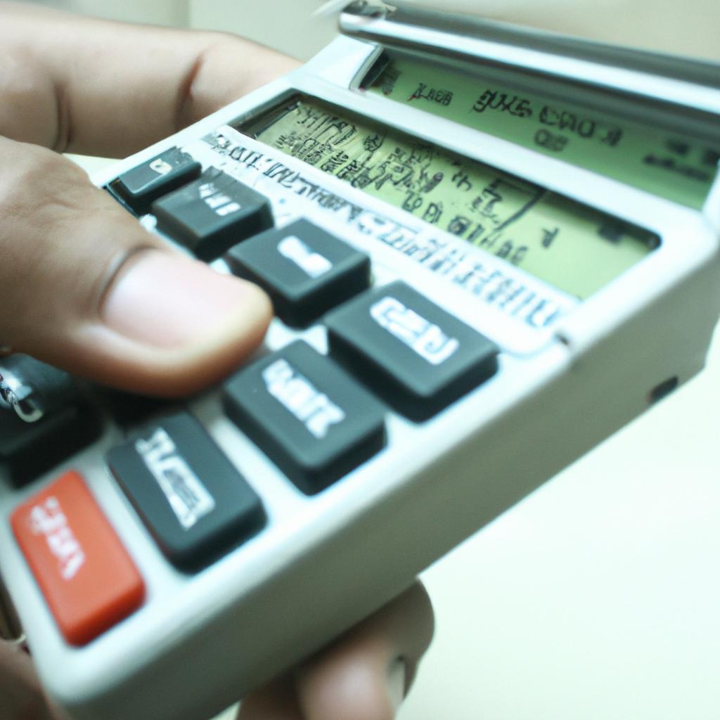 Person using mortgage calculator device